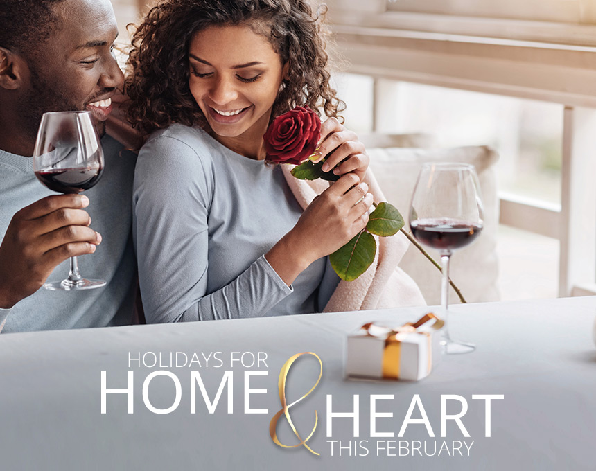 man and woman sharing glass of wine during February